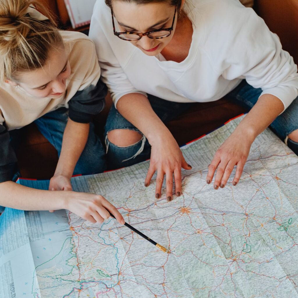 Planning a trip and reviewing a map as part of everyday life admin